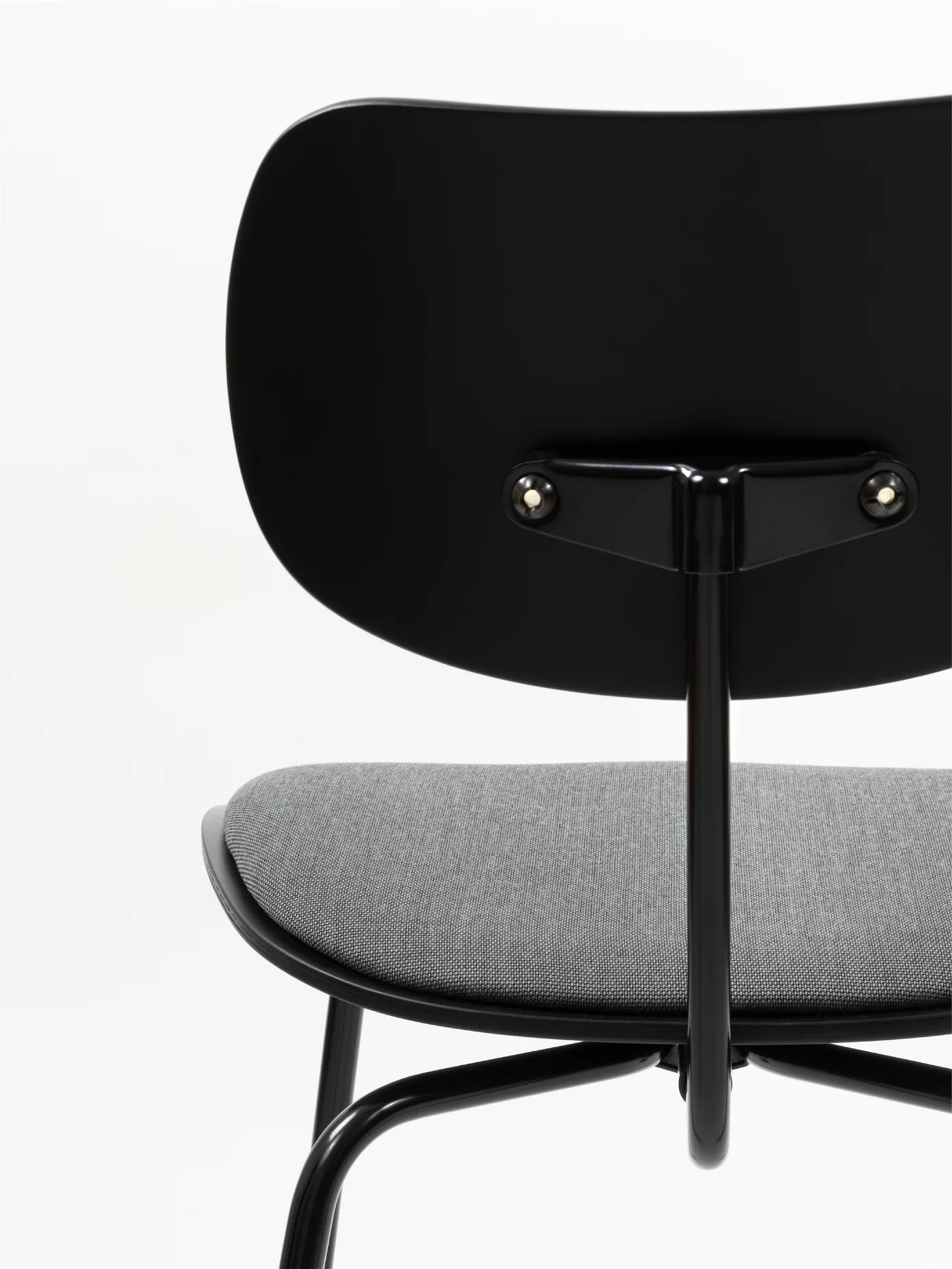 Detail of the SE 68 Multi Purpose Chair in black with upholstery