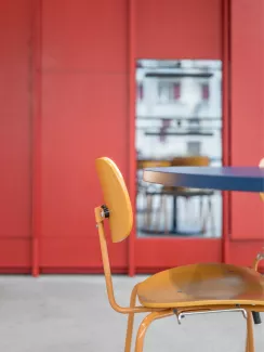 wilde-spieth_references_hochschulcampus-brig_6.jpg The SE 68 multi purpose chair in monochrome yellow in a modern colorful interior at Hochschulcampus Brig